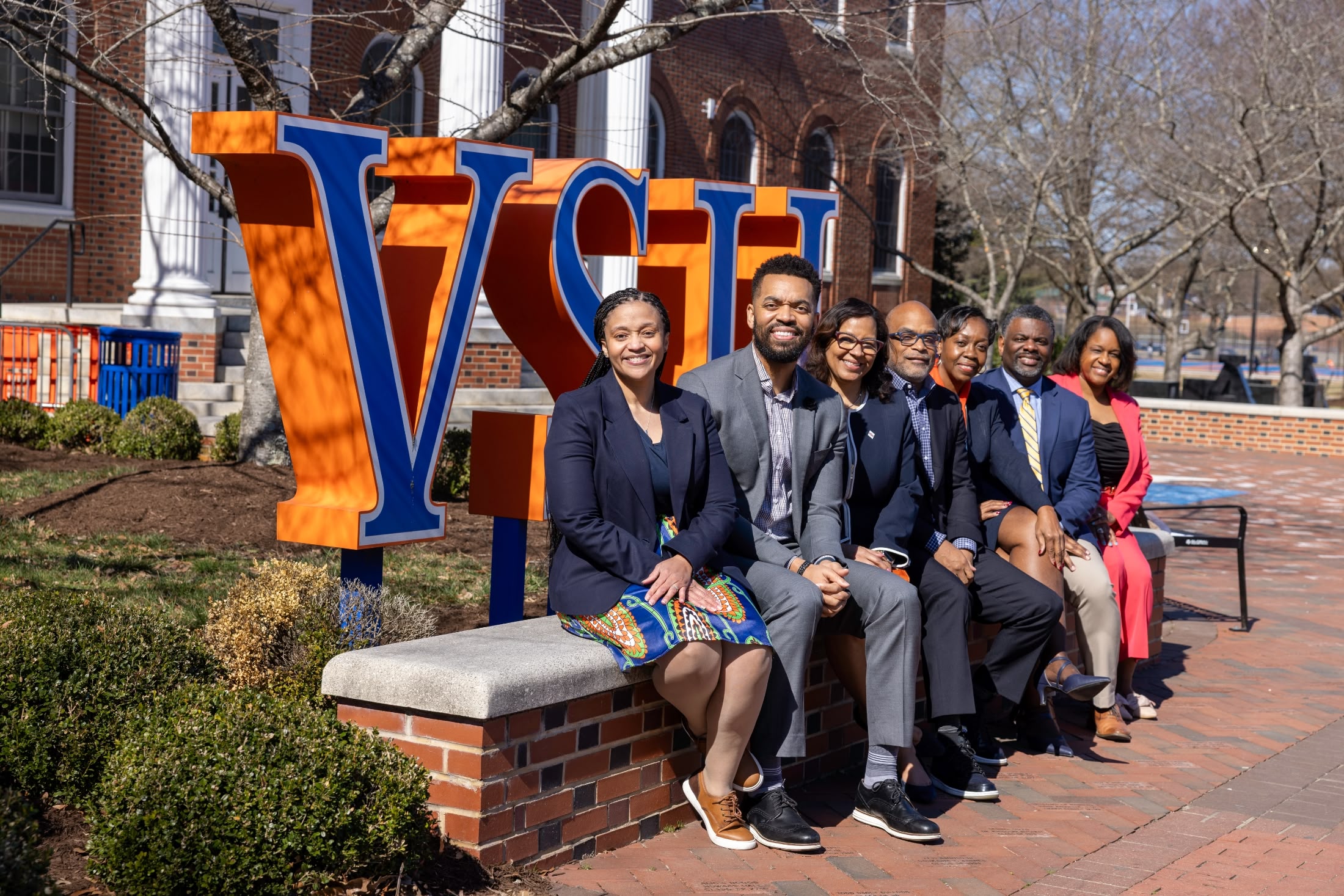 vsu group photo bench front steps signage